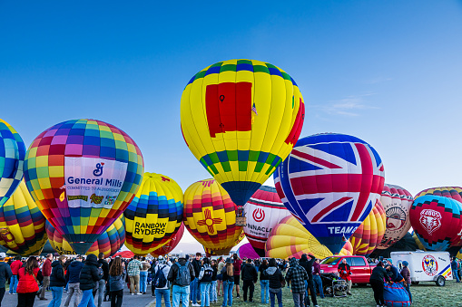Albuquerque, New Mexico - USA - Oct 14, 2023: Several hot air balloons preparing to launch at the Albuquerque International Balloon Fiesta