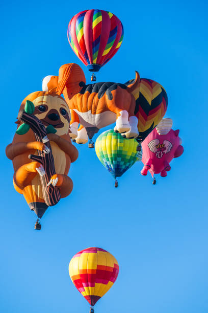 hot air balloon floating in a blue sky