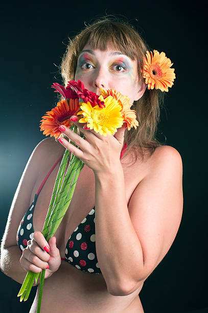 istock woman with bouquet 176426012