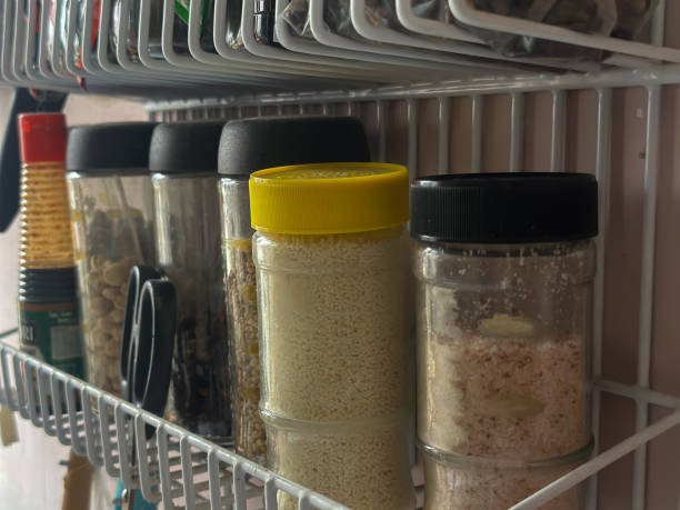 istock a jar with spices in white barred aluminum containers 1764266036