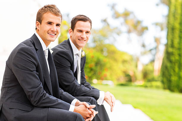 istock Groom And Best Man Sitting With Hands Clasped 176427378