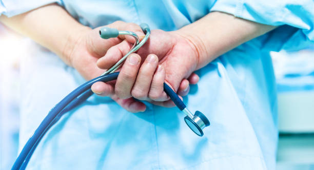istock Doctor with lab coat holding stethoscope 1764318957