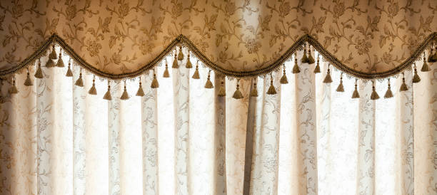 istock Luxurious curtains closed on window at home 1764321705