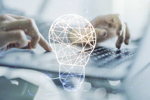 istock Double exposure of creative light bulb hologram with hands typing on laptop on background, research and development concept 1764322794