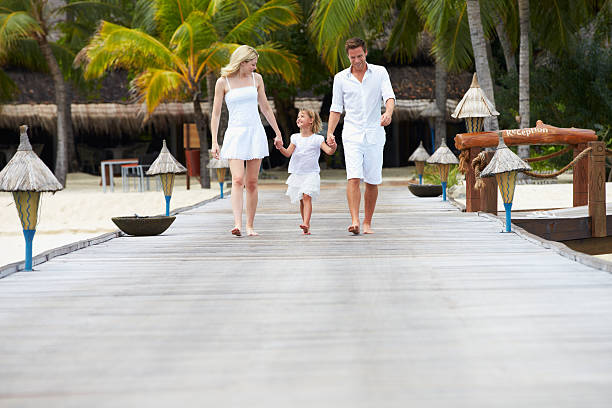 istock Family Walking On Wooden Jetty 176434058