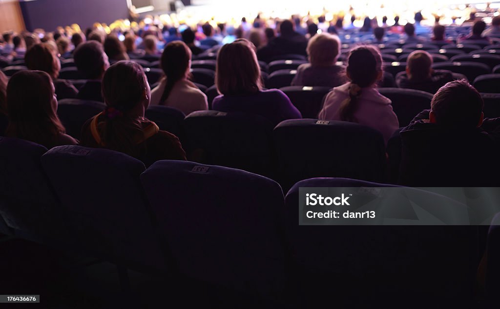 Viewers watching the show. Viewers watching the show. Long exposure shot. Theatrical Performance Stock Photo