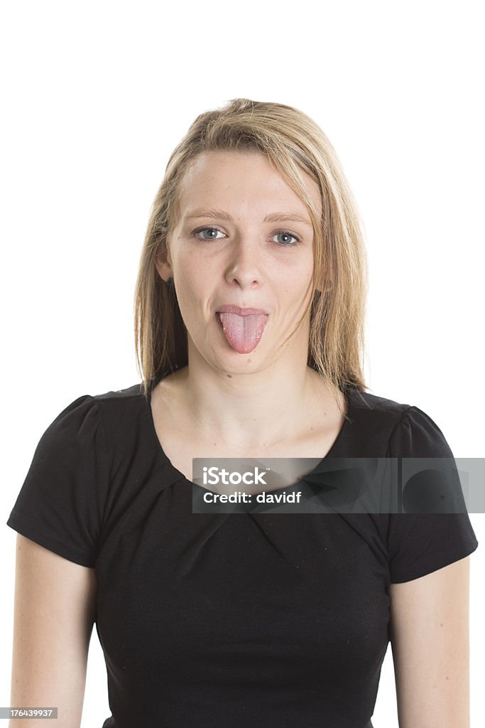 Hincar la lengua fuera - Foto de stock de 20 a 29 años libre de derechos
