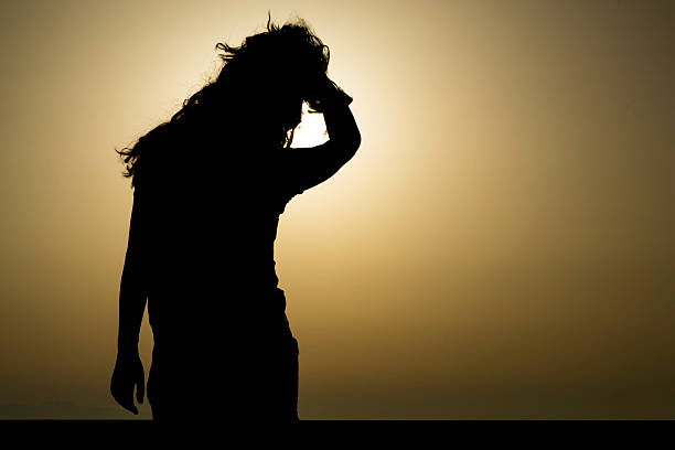 istock Girl silhouette on sunset 176440006