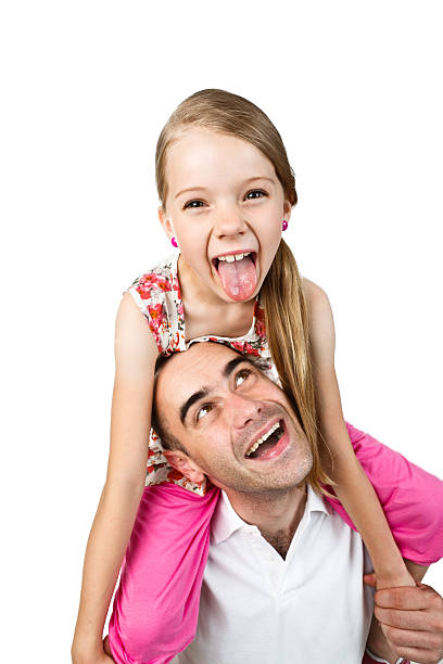 mid age man with his little daughter on white background