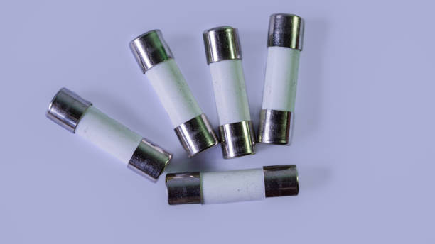 istock Ceramic fuse, metal top and bottom, white background, macro photography 1764417106
