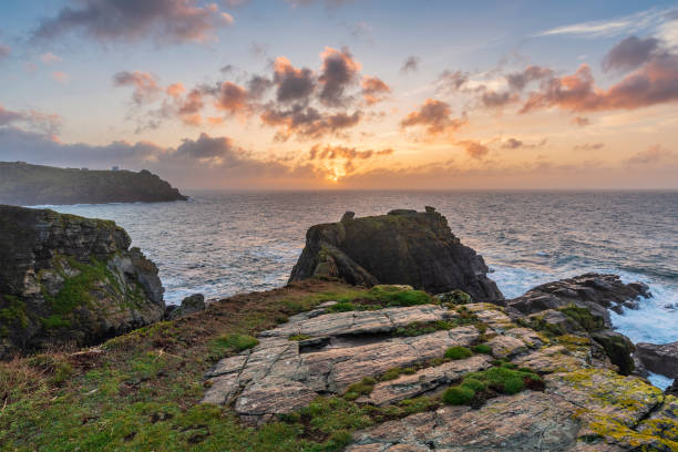 istock Beautiful dramatic Summer dawn over Lizard Point in Cornwall UK with lovely glowing sky and clouds 1764426336