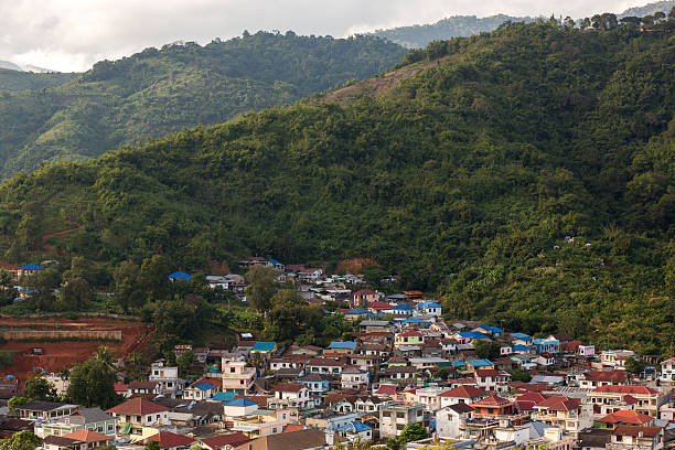 istock Village beside green mountain 176445019