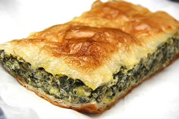 Spanakopita Classic Greek spinach pie appetizer. spanakopita stock pictures, royalty-free photos & images