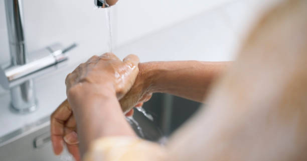 istock Woman washing hands 1764500425
