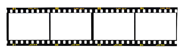 istock Four blank film frames on a reel 176450482