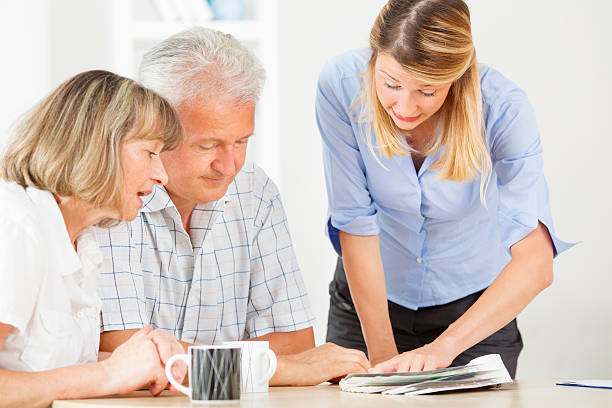 istock Senior Couple Meeting With Designer. 176450949