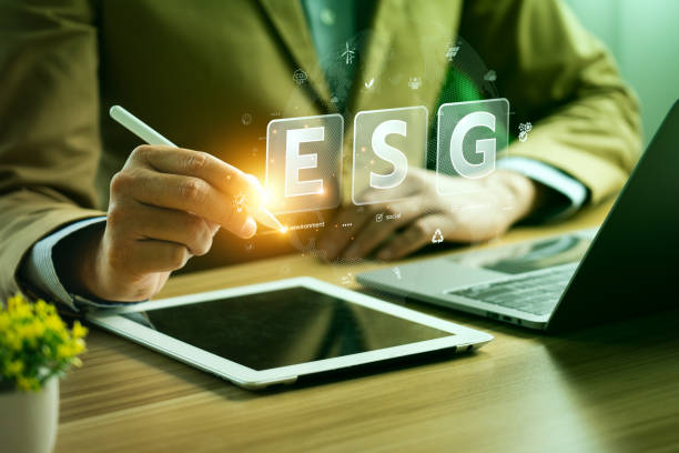 istock ESG environment social governance investment concept. Businessman using computer to analyze investment ESG. strategy that considers the environmental, company carbon labor practices, sustainability 1764517347