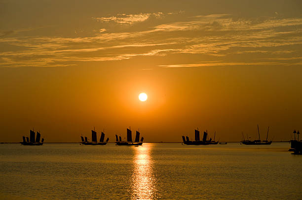 Sunset Sailing Sunset on the lake fishing,china lake tai stock pictures, royalty-free photos & images