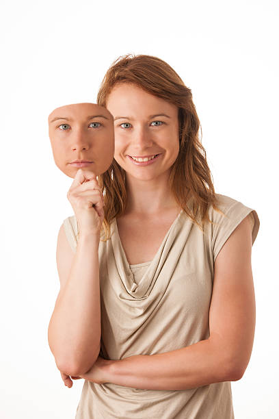 istock Woman hiding under the happy mask. 176455072