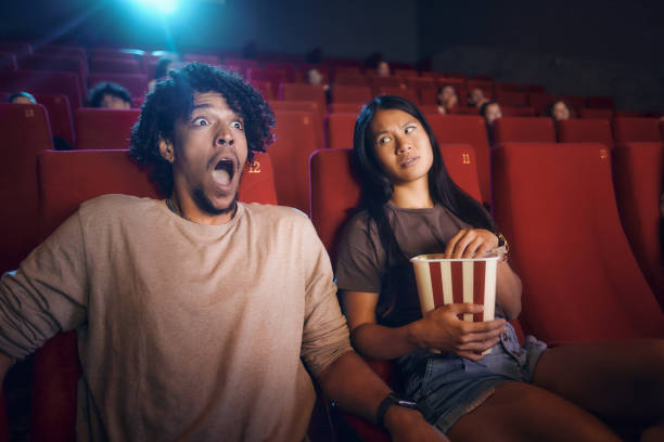 istock Oh my God, is he really afraid of this movie? 1764551138
