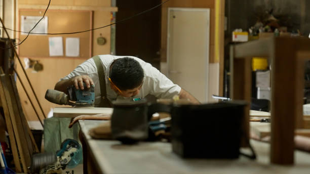 istock Japanese woodworkers working in the garage. 1764631125