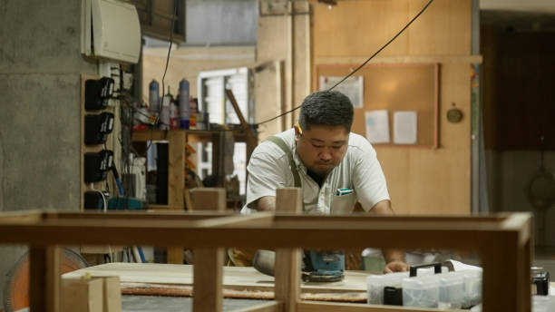 istock Japanese woodworkers working in the garage. 1764631345