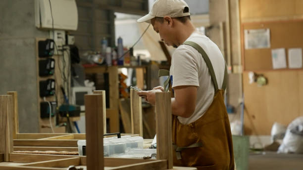 istock Japanese woodworkers working in the garage. 1764631646