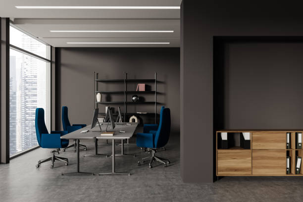 istock Gray open space office with bookcase and cabinet 1764632737
