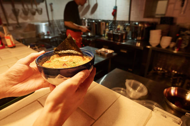 istock Bowl with hot appetizing ramen with seafood or some other condiment 1764639018