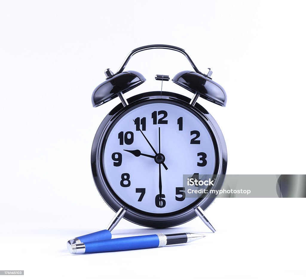 Reloj despertador con lápiz - Foto de stock de Aguja de Reloj libre de derechos