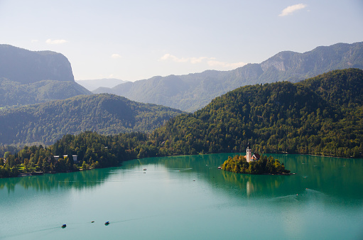 Lake Bled, Slovenia. Sunrise at Lake Bled with famous Bled Island and historic Bled Castle in the background.