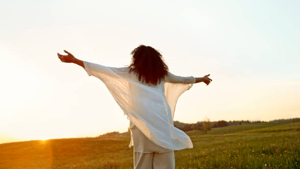 istock Woman standing in meadow 1764661524