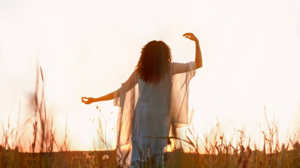 istock Woman standing in meadow 1764661542
