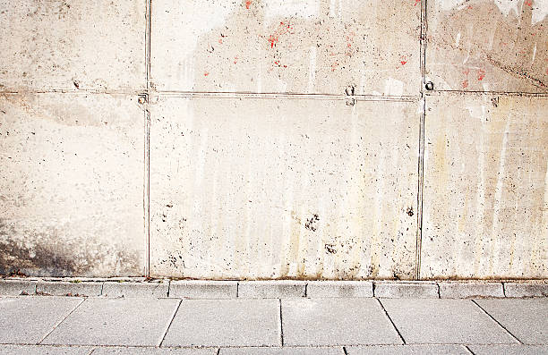 istock Old grunge concrete wall with walkway 176467910