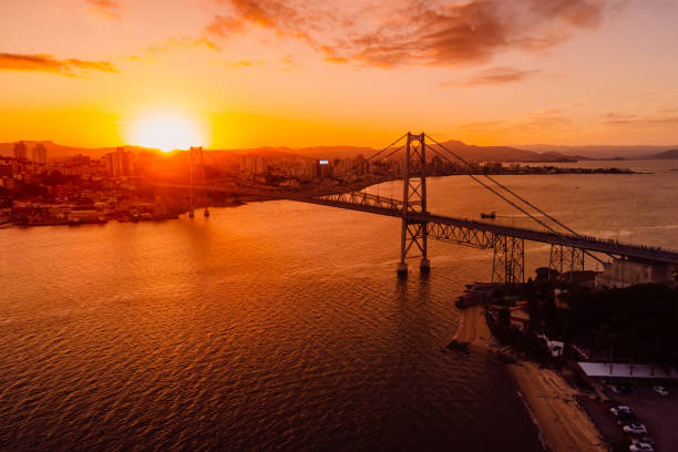 istock Old cable bridge with sunset in Florianopolis, Brazil. Aerial view 1764680823