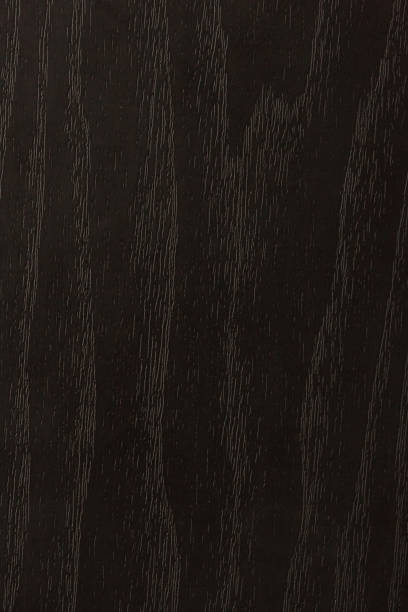 istock Black-painted wood with intricate wood grain visible 1764692224