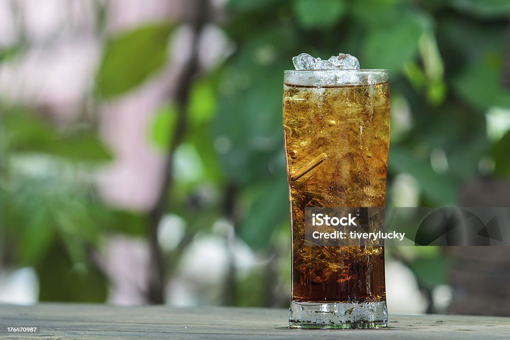 Cold Drink a glass of cold drink in backyard Brown Stock Photo