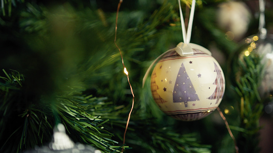 Christmas ball on a tree for holidays.