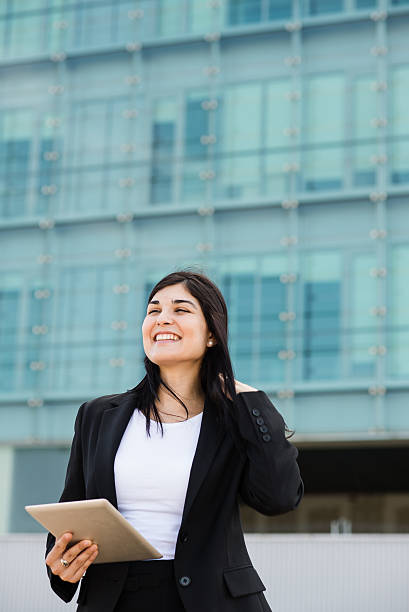 istock Entrepeneur with tablet in front of a bulding 176476922