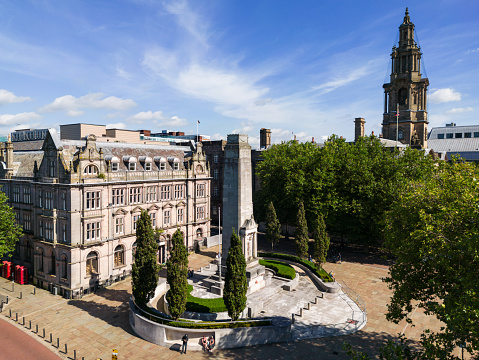 Bradford City Hall is a 19th-century town hall in Centenary Square, Bradford, West Yorkshire, England. It is known for its landmark clock tower and is a Grade I listed building.  It has bunting outside across the market square for Queen Elizabeth II platinum Jubilee.