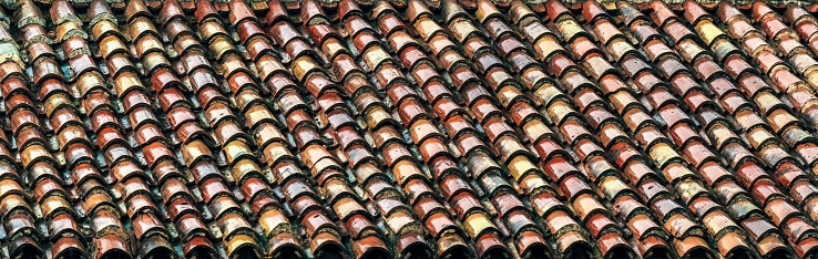 Old roof top wet after rain, selective focus