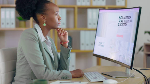 istock Business, computer and black woman planning, thinking and brainstorming with ideas, strategy and project development. African person, employee and consultant with corporate solutions, pc and research 1764789974