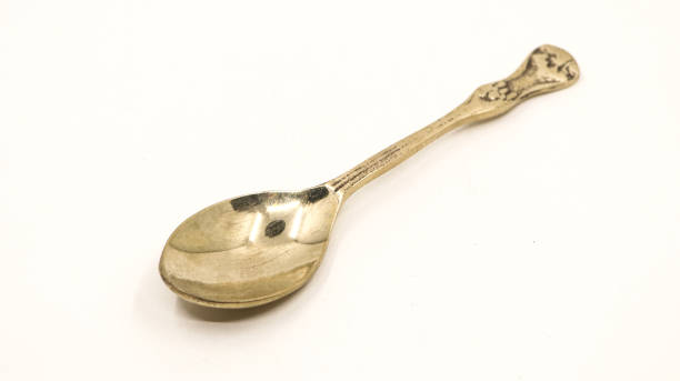 istock old antique bronze metal spoon 1764815110