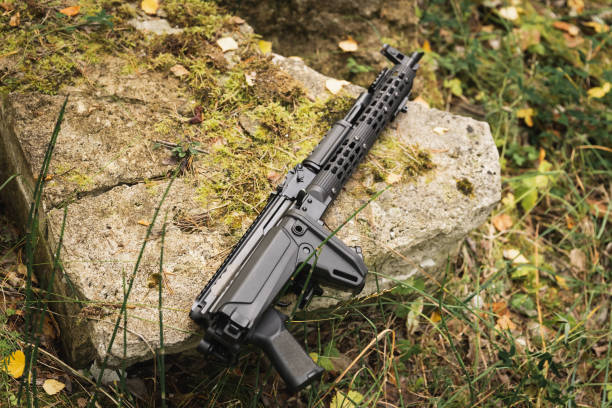 istock An assault rifle based on an old AK 47m abandoned in the forest. 1764851399