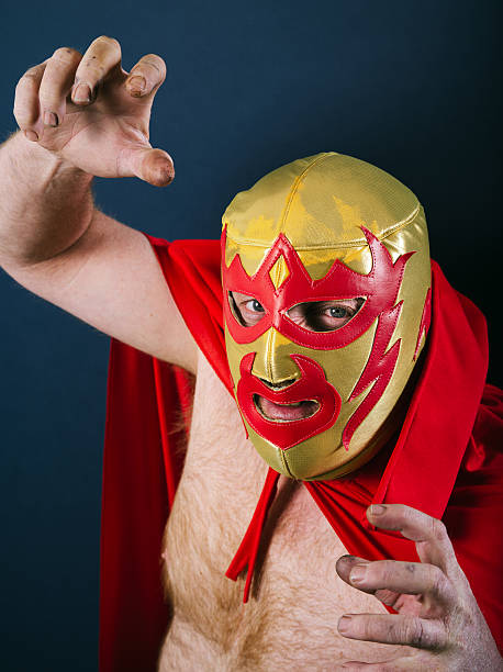 istock Mexican wrestler in a fight pose 176485906