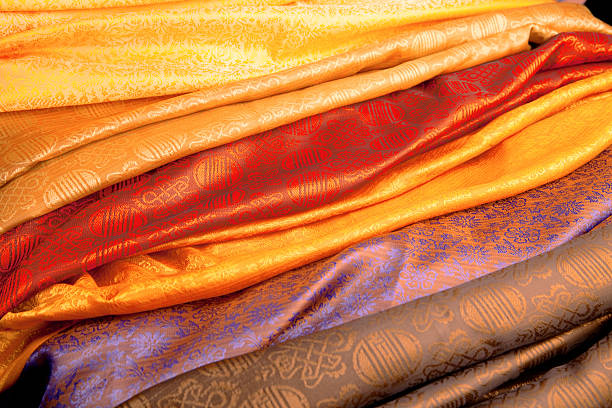 Color Indian fabric Color silk fabric from India. india indian culture market clothing stock pictures, royalty-free photos & images