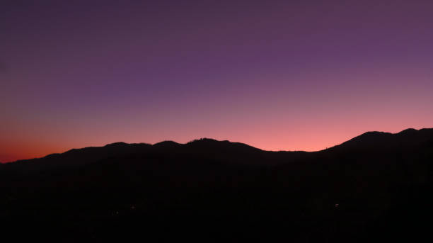 istock Silhouette Skyline at twilight time. Multicolored Amazing sky at Dusk or dawn. Twilight horizon landscape 1764870568