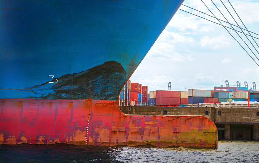 Detail of a containership lying at a pier