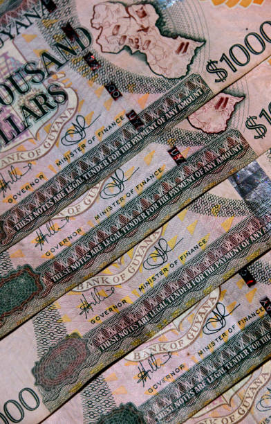 istock Guyanese banknotes, Guyana dollars bills, Georgetown, Guyana 1764900348