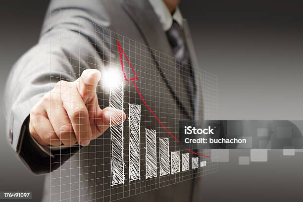 Businessman Hand Touch Virtual Graphchart Diagram Stock Photo - Download Image Now